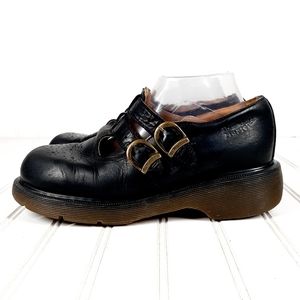 Dr. Martens Black Leather Flats with Gold Buckles